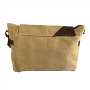Eco-friendly messenger bag in tan canvas with genuine leather accents, perfect for on-the-go lifestyle.