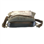 Eco-friendly shoulder bag Chateau Margaux showcasing upcycled canvas, leather, and functional pockets for everyday use.