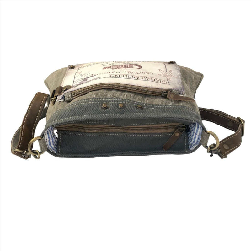 Eco-friendly shoulder bag Chateau Margaux showcasing upcycled canvas, leather, and functional pockets for everyday use.