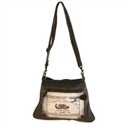 Eco-Friendly Shoulder Bag Chateau Margaux made of upcycled canvas and leather with adjustable straps.