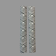 2 vertical appliance handle covers  with geometric patterns on a white surface