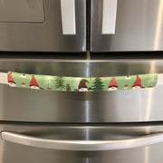 Gnomes on The Green Christmas Appliance Handle Covers in a festive kitchen setting.