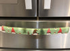 Gnomes on The Green Christmas Appliance Handle Covers in a festive kitchen setting.