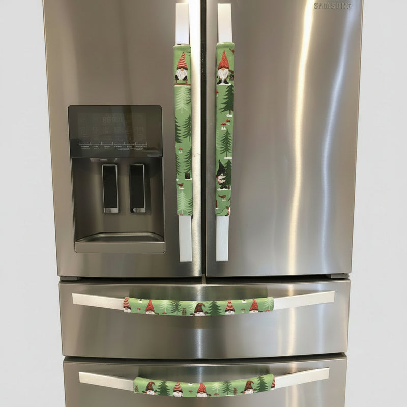 Gnomes on The Green Christmas Appliance Handle Covers on refrigerator handles in festive green and red design.