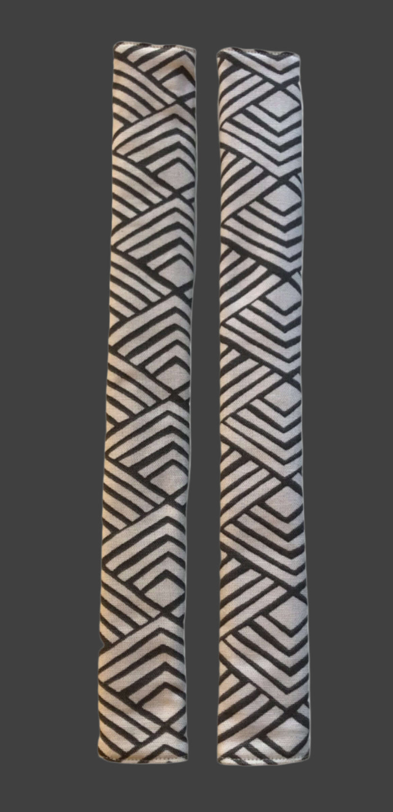 Geometric refrigerator handle covers in grey and white, reversible design showcasing a stylish pattern.