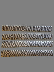 Geometric refrigerator handle covers in grey and white, showcasing a modern pattern and reversible design for stylish kitchens.