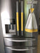 Grey Geometric to Yellow Reversible Appliance Handle Covers on fridge with matching towel.