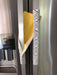 Grey Geometric to Yellow Reversible Appliance Handle Covers on refrigerator handles.