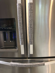 Grey Leaf Motif Appliance Handle Covers on stainless steel refrigerator, adding style and protection.