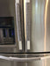 Grey Leaf Motif Appliance Handle Covers on stainless steel refrigerator, adding style and protection.