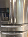 Grey Leaf Motif Appliance Handle Covers on stainless steel refrigerator handles for added style and cleanliness.