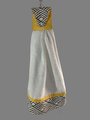 Handmade geometric kitchen hand towel with yellow accents and black and white patterns, perfect for functional decor.