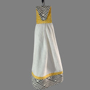 Handmade geometric kitchen hand towel in white and black with yellow accents, designed for stylish home decor and convenience.