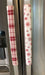Rose pink snowflake appliance handle covers on kitchen refrigerator, adding a festive touch to kitchen decor.