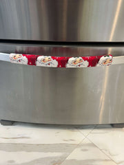 Winter Snowflakes Appliance Handle Covers on refrigerator doors for a festive kitchen look. 1PV