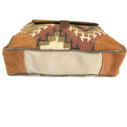 Jewel Toned Canvas Shoulder Bag with Flap Closure, showcasing stylish design and unique patterns.