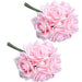 Bunch of pink latex-coated faux silk roses with curly petals and short stems for home decor.