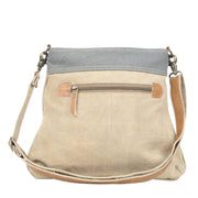 Mixed Canvas Crossbody Bag with adjustable strap and zippered pockets, ideal for stylish and practical everyday use.