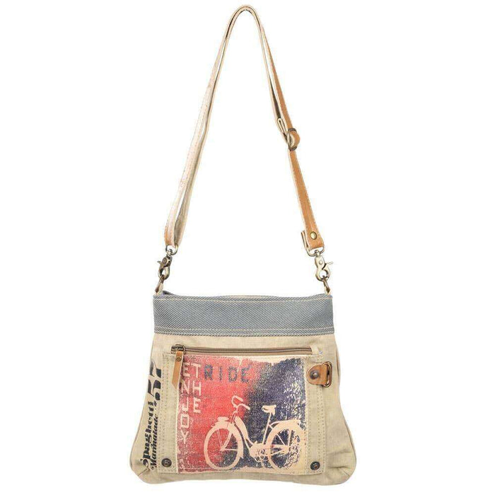 Mixed canvas crossbody bag featuring a bike graphic, zipper closure, and adjustable straps for stylish on-the-go essentials.