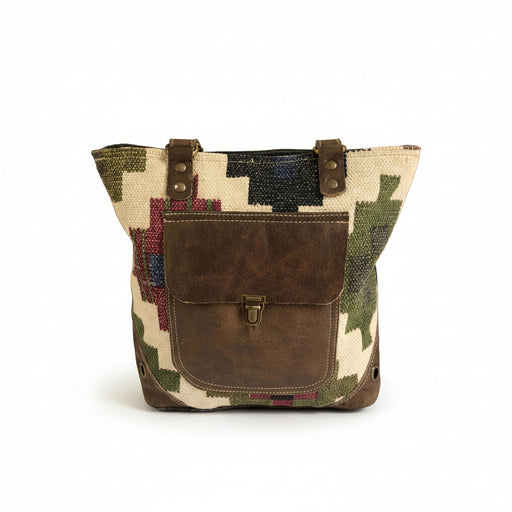 Multi Color Canvas Tote Bag With Leather Pocket featuring vibrant patterns and a stylish leather pocket.