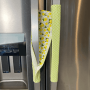 Pastel Mint Green & Lemon Print-Reversible Refrigerator Handle Covers on stainless steel fridge handles.