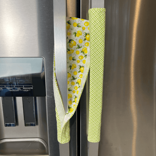 Pastel Mint Green & Lemon Print-Reversible Refrigerator Handle Covers on stainless steel fridge handles.