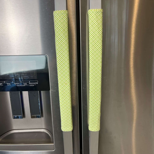 Pastel Mint Green & Lemon Print-Reversible Refrigerator Handle Covers on stainless steel refrigerator