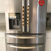 Plaid-patterned handle covers on a fridge showing front and back.