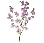 Artificial dancing lady orchid branch on a textured white background