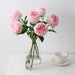 Real Touch Royal Peony Artificial Stem in a vase with pink flowers and a teacup on a table.