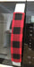 Red and black buffalo check appliance handle covers on a microwave, adding rustic charm to kitchen decor.