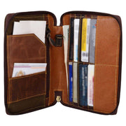 RFID passport utility wristlet interior view showing credit card slots and zippered pocket.