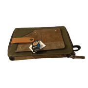 RFID passport utility wristlet featuring RFID protection, multiple card slots, and made from upcycled leather and canvas.