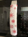 Rose pink snowflake appliance handle covers on a microwave, adding a festive touch to kitchen decor.