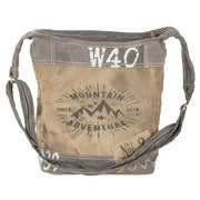 Rustic Canvas Crossbody Bag with Mountain Adventure design, adjustable strap, and spacious zippered pockets.