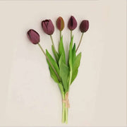 Soft silicone artificial tulip bouquet in shades of purple, ideal for home decor and special occasions.