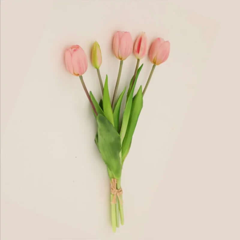 Soft silicone artificial tulip bouquet in soft pink and green, perfect for home decor and special occasions.