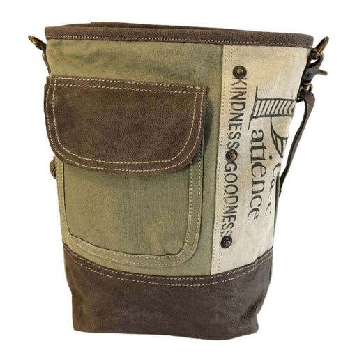 Upcycled canvas and leather crossbody bag featuring the words 'Peace' and 'Patience' with a stylish pocket.