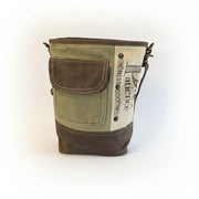 Upcycled Canvas and Leather Crossbody Bag - Peace & Patience with pockets and a stylish design.