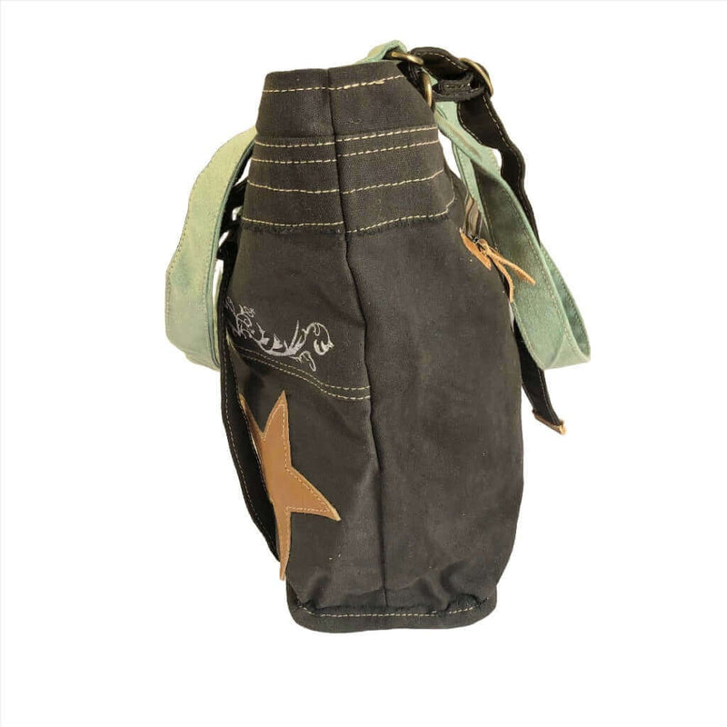 Upcycled canvas shoulder bag grey with aqua featuring a leather star and zippered closure, perfect for eco-friendly enthusiasts.