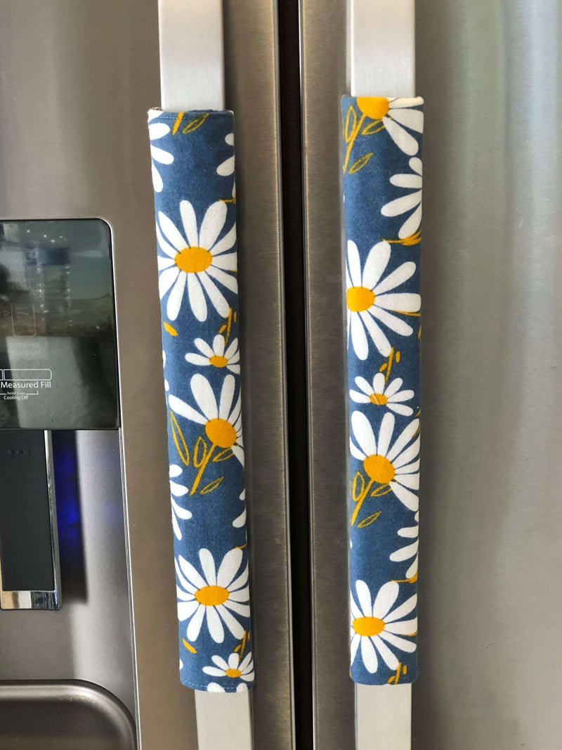 White and Yellow Daisy on Blue Appliance Handle Covers on refrigerator handles
