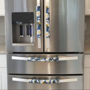 White and Yellow Daisies on Blue Appliance Handle Covers on stainless steel refrigerator handles