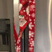 Winter snowflakes appliance handle covers on refrigerator handles, adding festive holiday charm and protection.