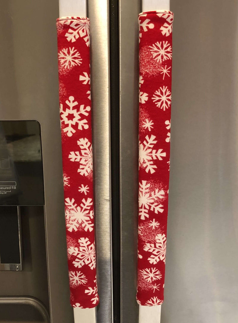 Winter Snowflakes Appliance Handle Covers on refrigerator doors for a festive kitchen look.