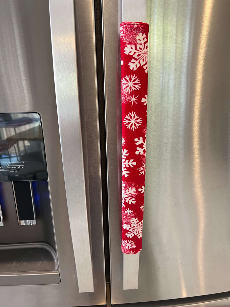 Winter Snowflakes Appliance Handle Covers on refrigerator doors for a festive kitchen look. 1V